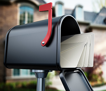 mailbox with mail overflowing